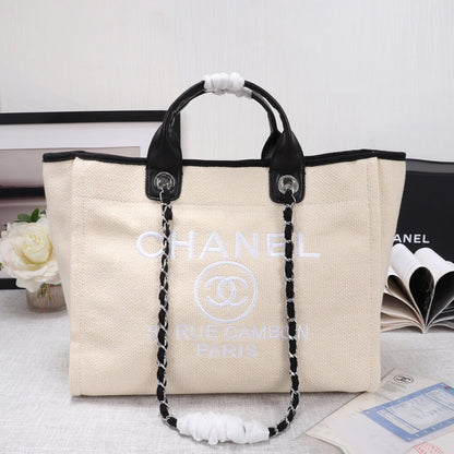 CHANEL Woven Straw Raffia Striped Medium Deauville Tote